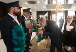 خادمان حرم حضرت معصومه (س) با پرچم  متبرک در مجمع تشخیص حضور یافتند